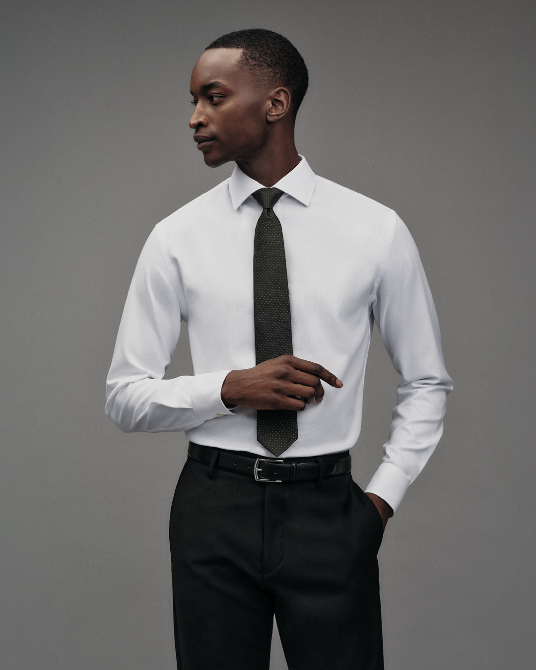 Man in white shirt and black tie